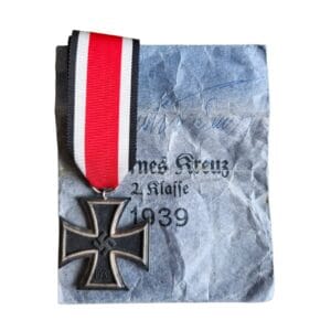 iron cross second class maker marked 65 klein und qeunzer with pouch front