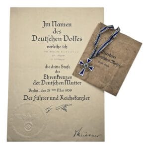 mothers cross in bronze with packet and document