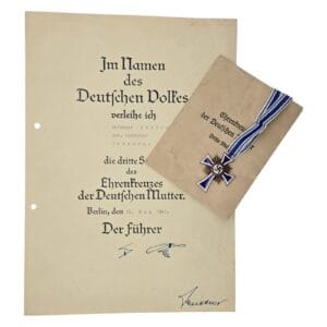 moederkruis in brons met zakje en oorkonde maker gemarkeerd donner