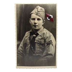 hitler jugend cap badge with period photo front photo